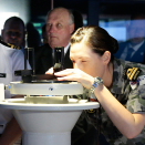 King Harald got to see one of the simulators delivered by Kongsberg Maritime in action. Photo: Lise Åserud, NTB scanpix